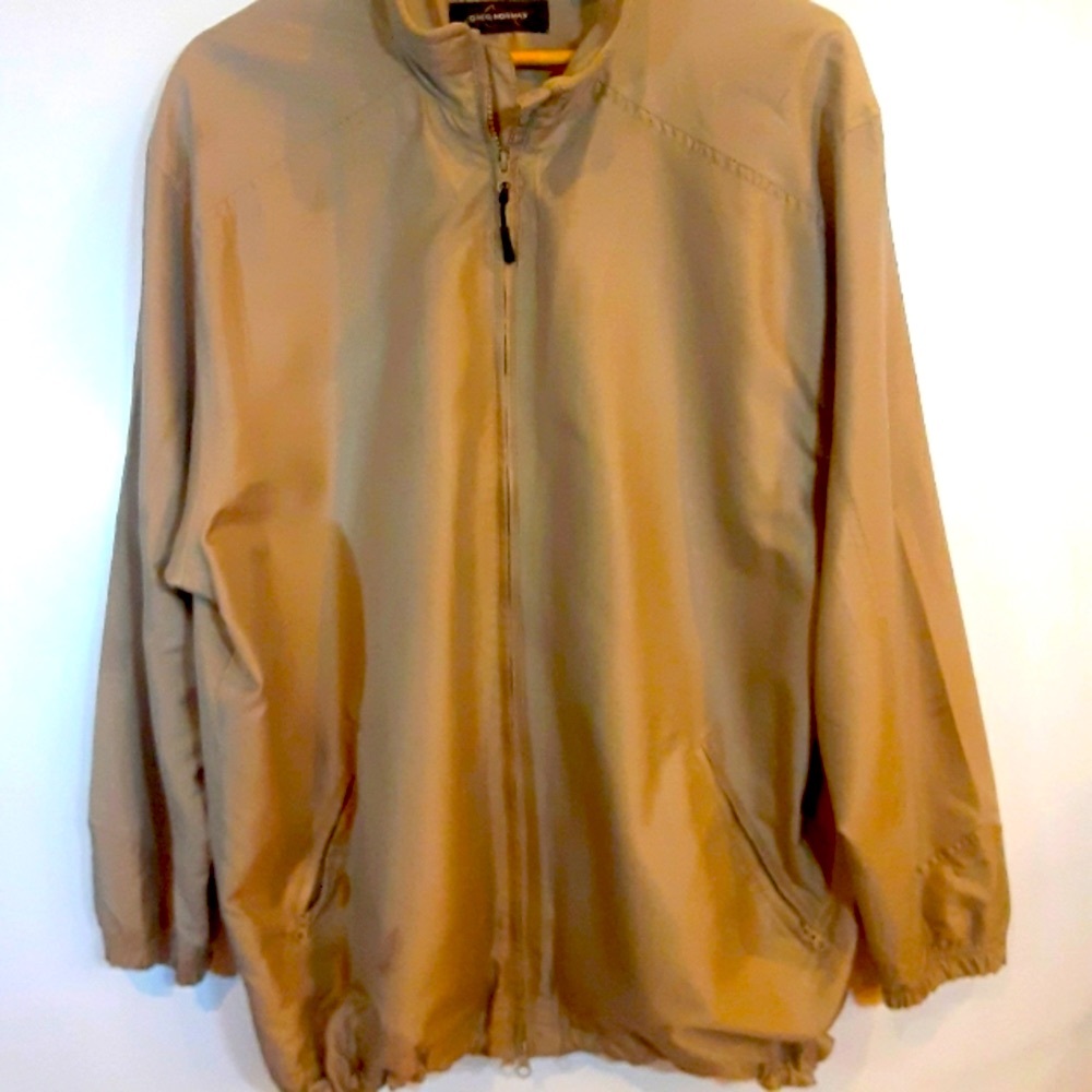 Greg Norman Tan windbreaker jacket.  Perfect for a round of golf.